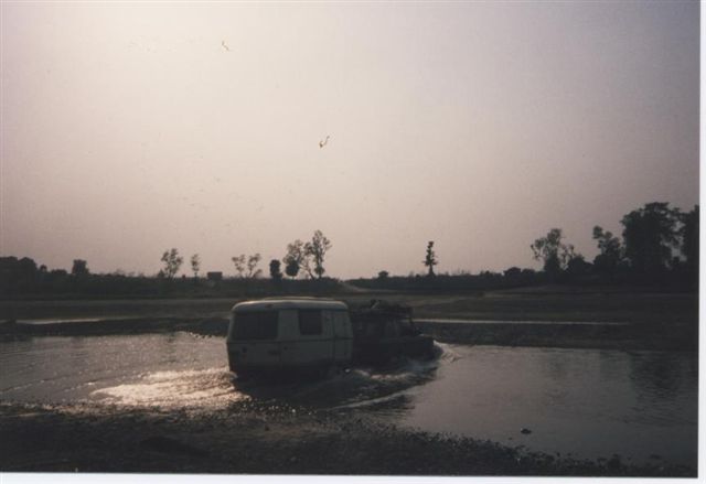 0Royal_Bardia_Nepal_fording_river_at_dusk.jpg